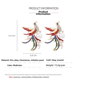 Detail showing dimensions of alloy phoenix earrings with rhinestones and faux pearls