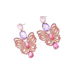 Close-up of luxury gold butterfly earrings with pink crystals and hollow wings detail
