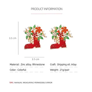 Boucles d'oreilles bottes de Noël en émail rouge avec fleurs et strass brillants