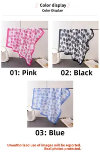 Detailed view of silk-like square scarves with shell prints in pink black and blue