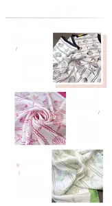 Detail view of silk-like scarf showing shell print and premium hand-rolled hem edges