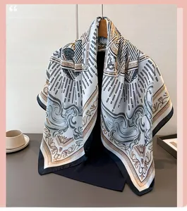 Detail view of printed satin scarf with baroque patterns and elegant geometric lines