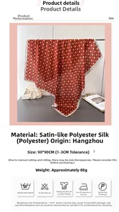 Detailed view of red-brown geometric polka dot silk-satin scarf measuring 90x90cm