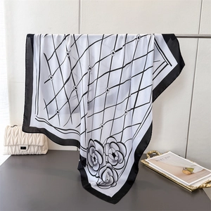 Elegant floral satin silk square scarf with camellia patterns and black grid design
