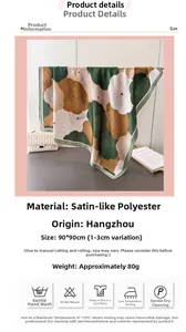 Detail of 90x90cm floral satin silk scarf with elegant green and brown flower patterns