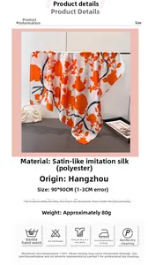 Details des 90x90cm Satin-Halstuchs mit orangefarbenem Blumen- und blauem Bandmuster