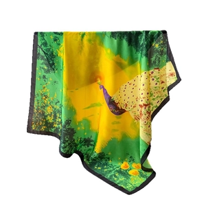 Elegant peacock print satin silk square scarf with vibrant yellow and green floral patterns