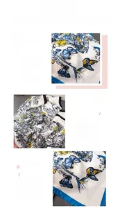Détail du foulard en soie avec imprimé papillon montrant la texture et l'ourlet fini