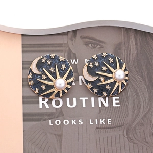 Retro palace style star and moon earrings with blue enamel and pearl sun in gold finish
