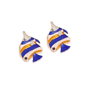 Detail of colorful enamel tropical fish earrings with sparkling crystal accents