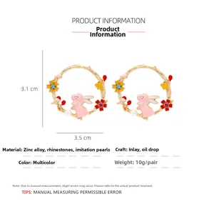 Detailed size chart for pink rabbit wreath earrings with rhinestones and faux pearls