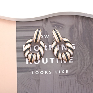 Retro geometric black and white enamel earrings in gold-tone luxury style