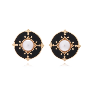Vintage round button stud earrings with gold metal, black enamel and white pearl center