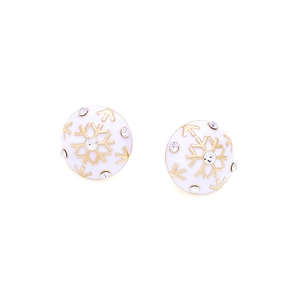 Elegant gold snowflake stud earrings with white enamel and sparkling crystals on white background