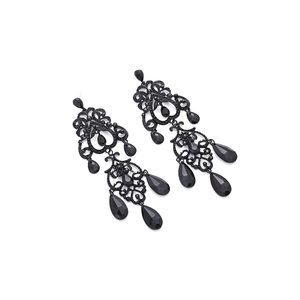 Vintage black teardrop tassel earrings with intricate filigree and sparkling rhinestones