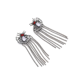 Vintage spider tassel earrings with sparkling rhinestones and drop-shaped crystals