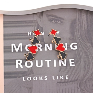 Funny poker card earrings with red hearts and black spade enamel charms in gold finish