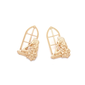 Retro hollow alloy earrings featuring a girl silhouette at an arched window in gold finish