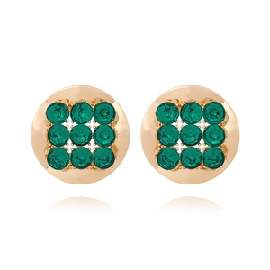 Vintage round gold-tone earrings with textured alloy and green crystal inlays