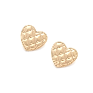 Detail of gold heart earrings with quilted texture and rope border for women