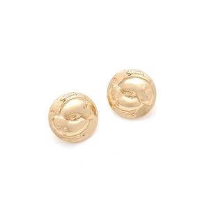 Vintage golden relief Pisces stud earrings with intricate celestial star details