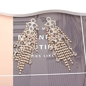Elegant long crystal tassel earrings with gold-plated base for wedding and party wear