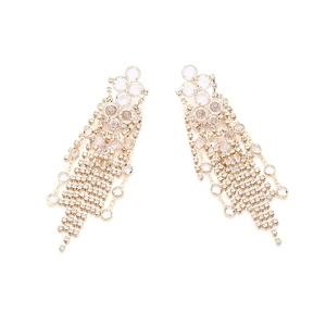 Close-up of long cascading crystal tassel earrings with sparkling rhinestone fringe detail