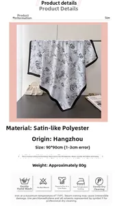 Detailed view of ink floral pattern on 90x90cm satin silk-like square scarf for women