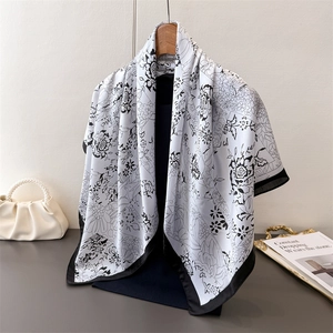 Ink floral faux silk square scarf with vintage black and white print on elegant wood hanger