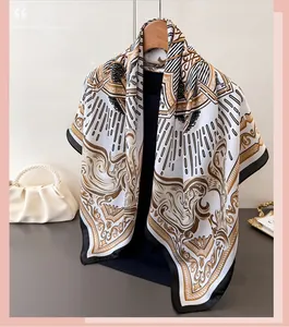 Detailed texture of white silk scarf with baroque gold and black floral patterns
