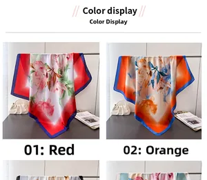 Close-up of silk-feel square scarf with red and orange peony floral patterns