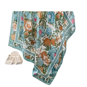 Floral satin square silk scarf in mint green with blue and orange botanical flower prints