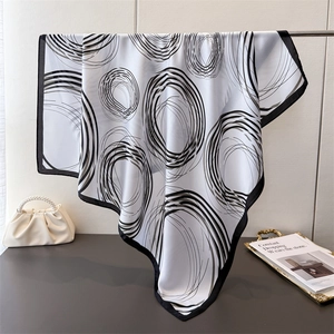 Elegant white square silk scarf with black geometric abstract spiral patterns for women
