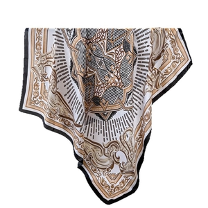 Baroque style silk-like square scarf featuring elegant gold and black floral pattern