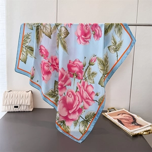 Romantic floral satin square scarf with pink roses, orange borders, and elegant blue tone
