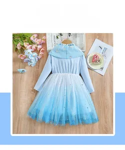 Detail of blue gradient mesh skirt with silver star sequins and snowflake collar