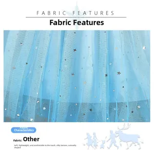 Close-up of light blue mesh fabric with silver star and moon patterns for girls' dress