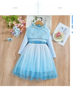 Detail of blue Elsa inspired girls dress with snowflake sequins and sheer mesh layers