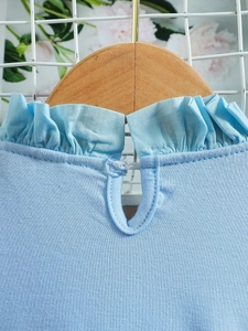 Blue Elsa princess dress for girls featuring a ruffled neckline and back teardrop cutout