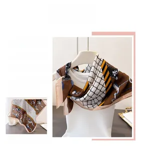Detail of herringbone cotton-linen feel silk scarf with chain and geometric patterns