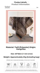 Detail of leopard print scarf showing the herringbone weave texture and soft polyester fabric