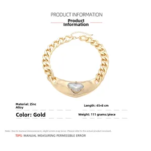 Detail of heavy gold Cuban chain necklace with crystal teardrop pendant dimensions