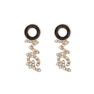 Minimalist black enamel and rhinestone alphabet earrings set in gold alloy finish
