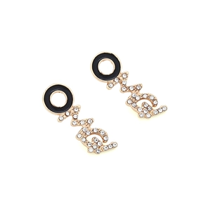 Minimalist gold LOVE earrings with pearls, crystals, and black enamel drip oil design