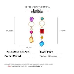 Detailed view of asymmetric water drop earrings showing dimensions of 11.0cm and 12.5cm