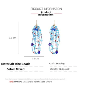 Detail view showing handmade colorful beaded tassel earrings dimensions of 8.8cm by 1.4cm