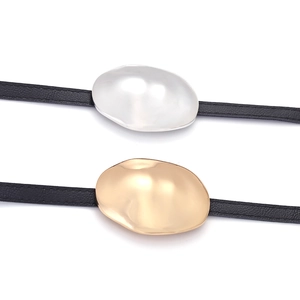 Irregular gold and silver metal buckle belts on black PU leather straps