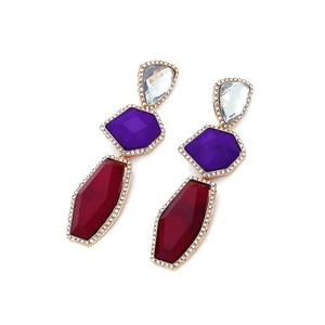 Detailed view of layered geometric drop earrings with multi-color resin and rhinestones