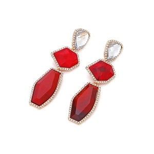 Detailed macro view of long red geometric resin earrings with sparkling rhinestone trim