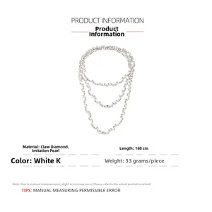 Detail of layered long necklace with faux pearls and rhinestones measuring 168cm in length